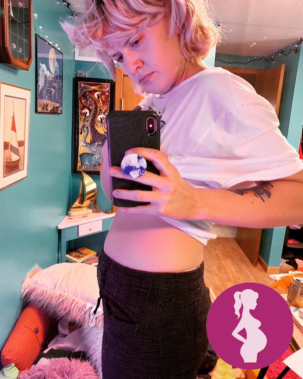 I love this picture cuz I was obviously trying to detect a baby bump in my very newly pregnant body….